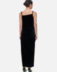 Luxurious and sophisticated ambiance in a velvet spaghetti strap maxi dress with irregular V-neck design