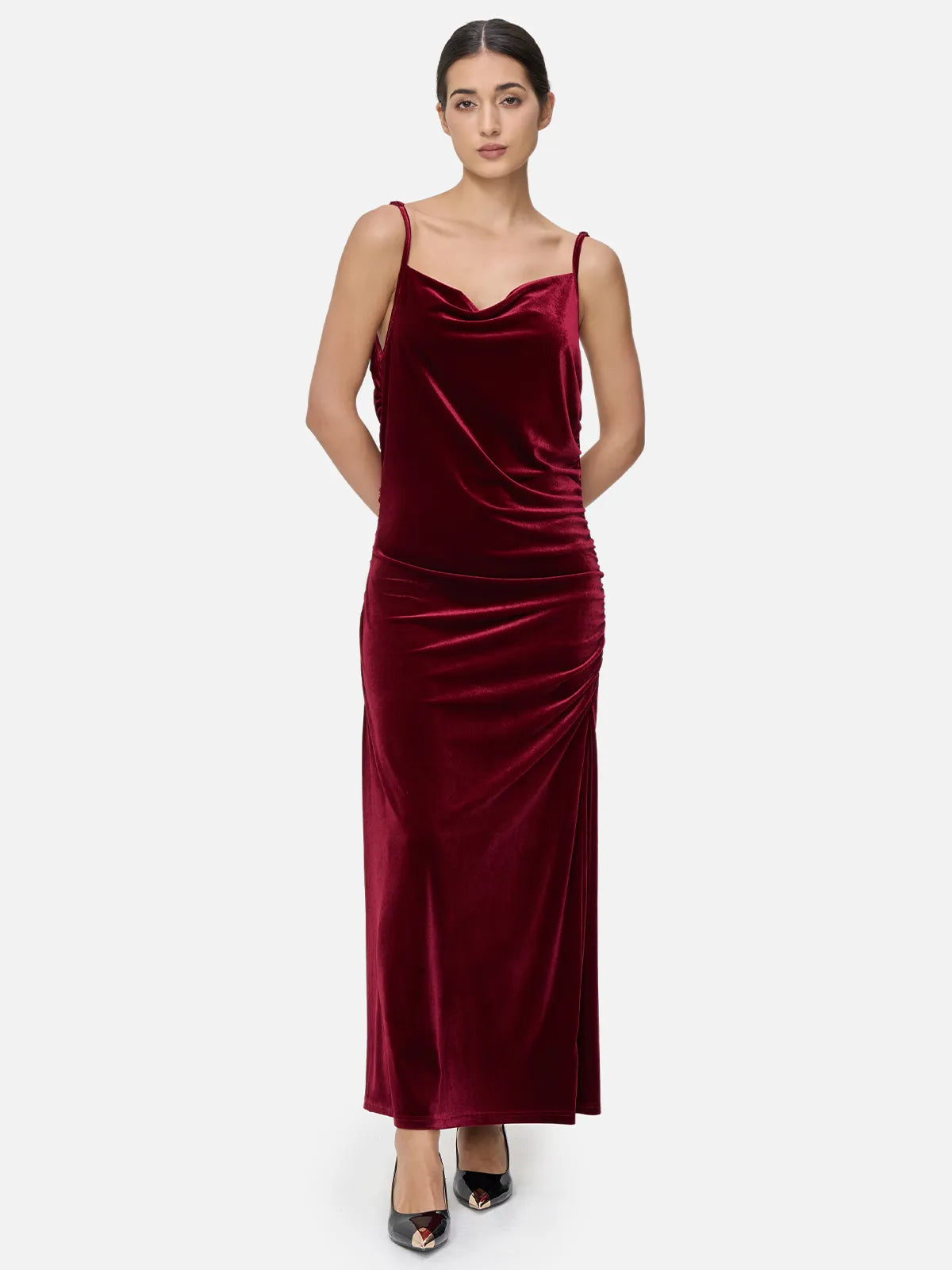 Fashionable and romantic women&#39;s clothing with irregular V-neck design and pleated detailing in a velvet spaghetti strap maxi dress