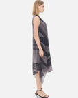 Elevate your wardrobe with the charm of this sleeveless chiffon dress adorned with an irregular print.