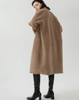 Open-front design, brown long coat with elegant lines, a fashionable wardrobe staple)