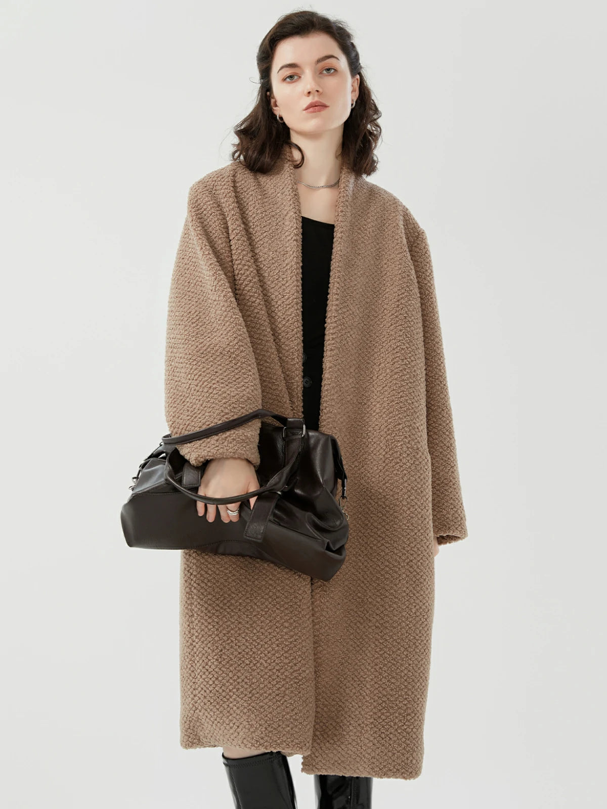 Exquisite appearance of brown Sherpa Fleece open-front coat, offering versatile styling.