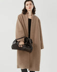 Exquisite appearance of brown Sherpa Fleece open-front coat, offering versatile styling.