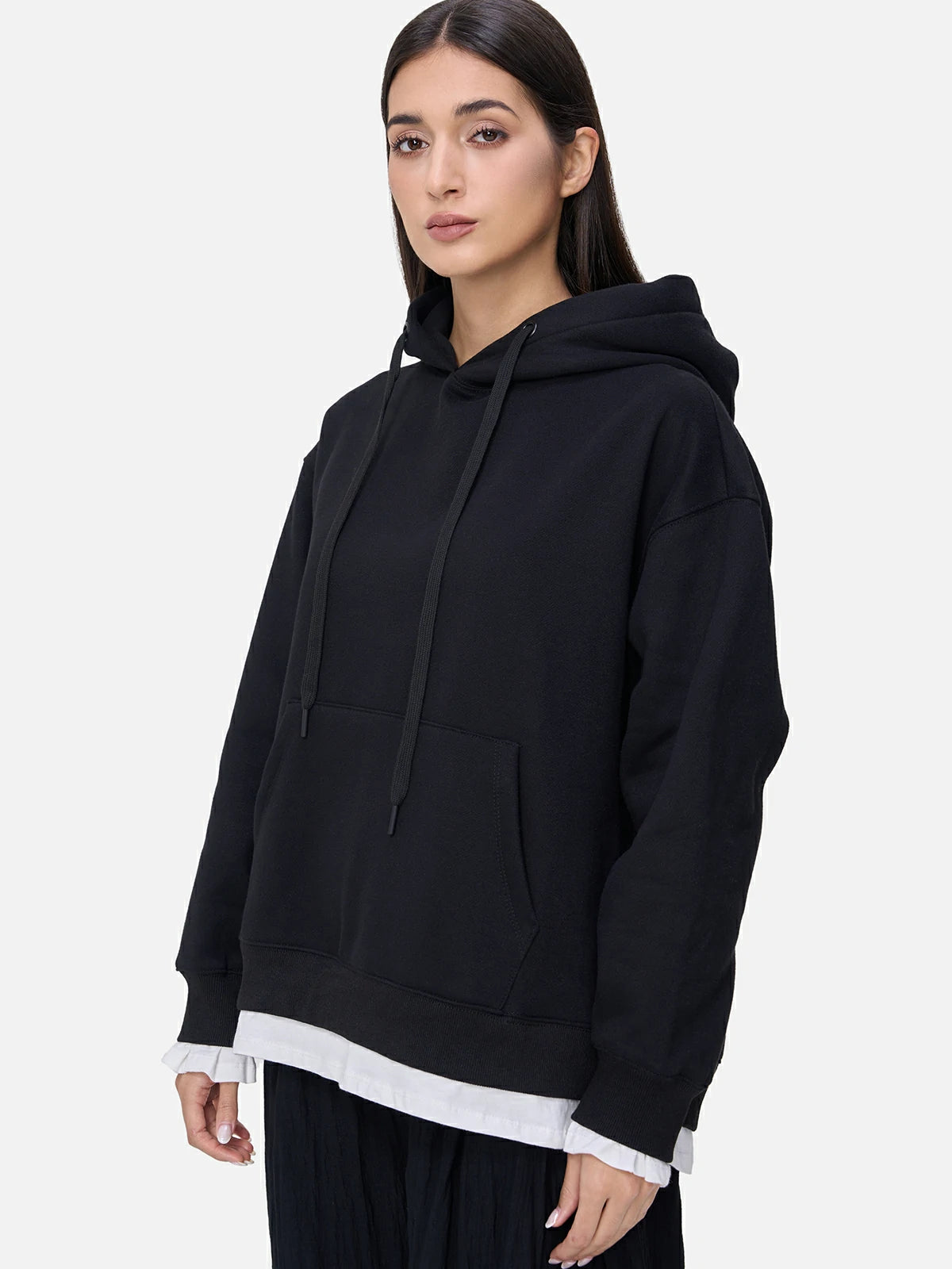 Stylish pairing with a black loose-fitting hooded sweatshirt