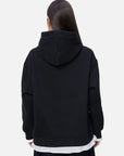 Winter warmth meets fashion in this black loose-fitting hooded sweatshirt 