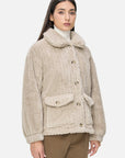 Soft and Warm Outerwear: Stay cozy and stylish with this soft and warm apricot fleece jacket for the colder seasons.