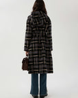 Retro-inspired blue-black plaid coat with a hood for a cozy and chic ensemble