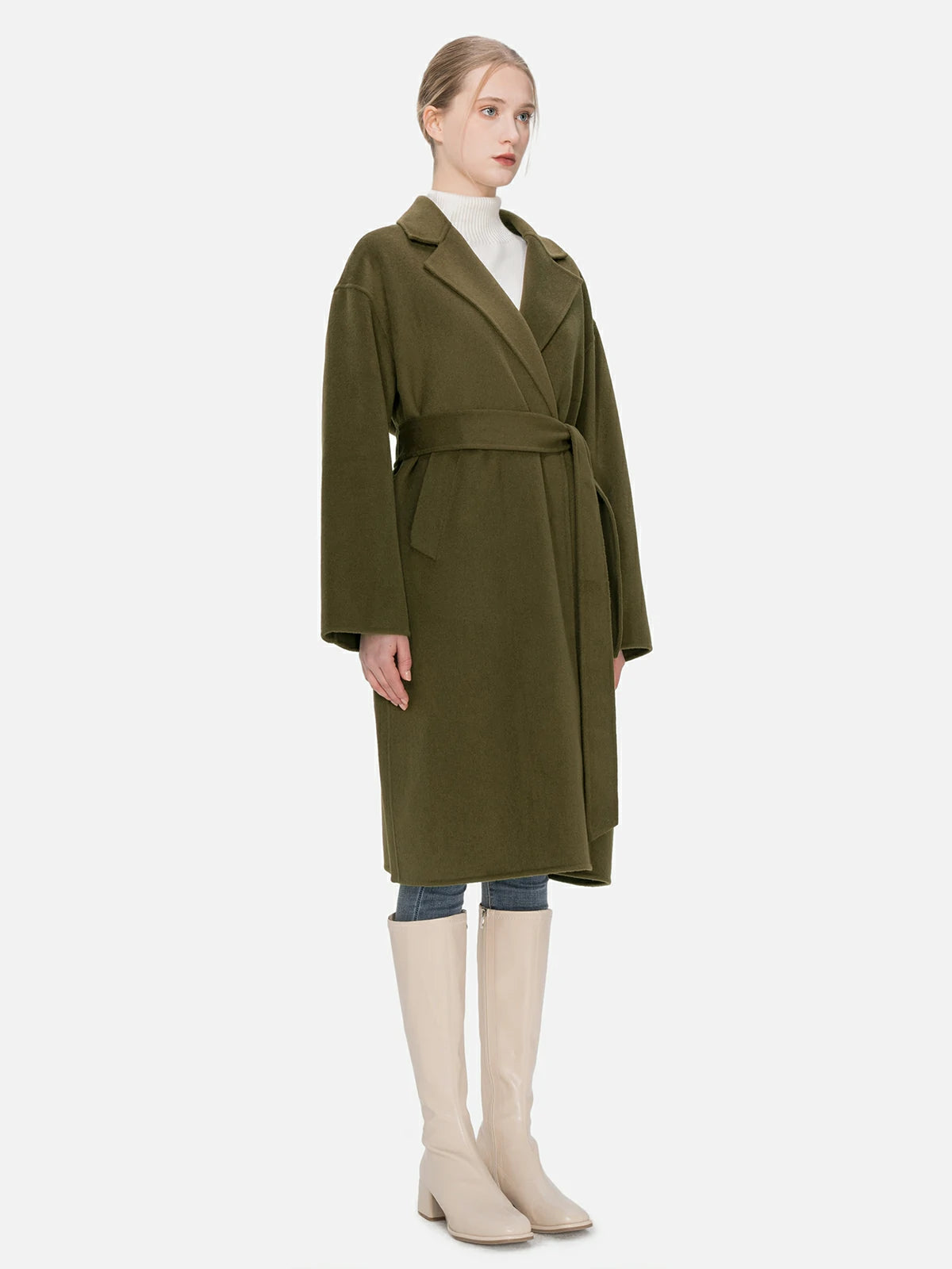Make a statement with this deep olive green mid-length wool coat, boasting a lapel and belt design, concealed buttons, and a tailored fit that enhances the feminine silhouette.