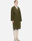 Make a statement with this deep olive green mid-length wool coat, boasting a lapel and belt design, concealed buttons, and a tailored fit that enhances the feminine silhouette.