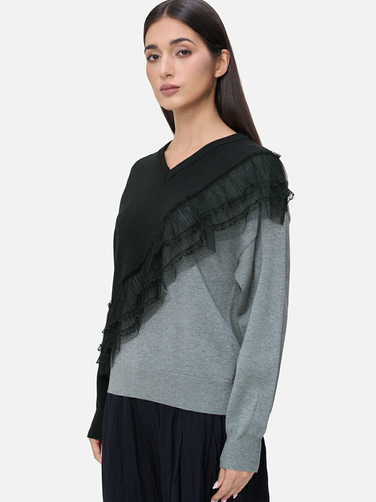 Elevate your wardrobe with this chic round neck sweater, featuring a sophisticated black and gray color-blocked design and delicate lace chiffon detailing for an effortlessly stylish look.