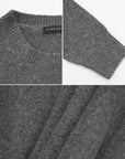 Immerse yourself in the comfort and style of this gray round-neck knitwear, designed with classic details and a versatile fit.