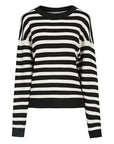Stay on-trend with this modern ribbed sweater, complete with a round neckline and classic black and white stripes, offering a perfect balance of sophistication and contemporary style.