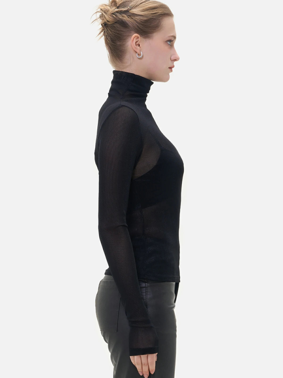 Embrace mysterious charm and sensual fashion with this slim-fit black sheer mesh top featuring a high-neck design.