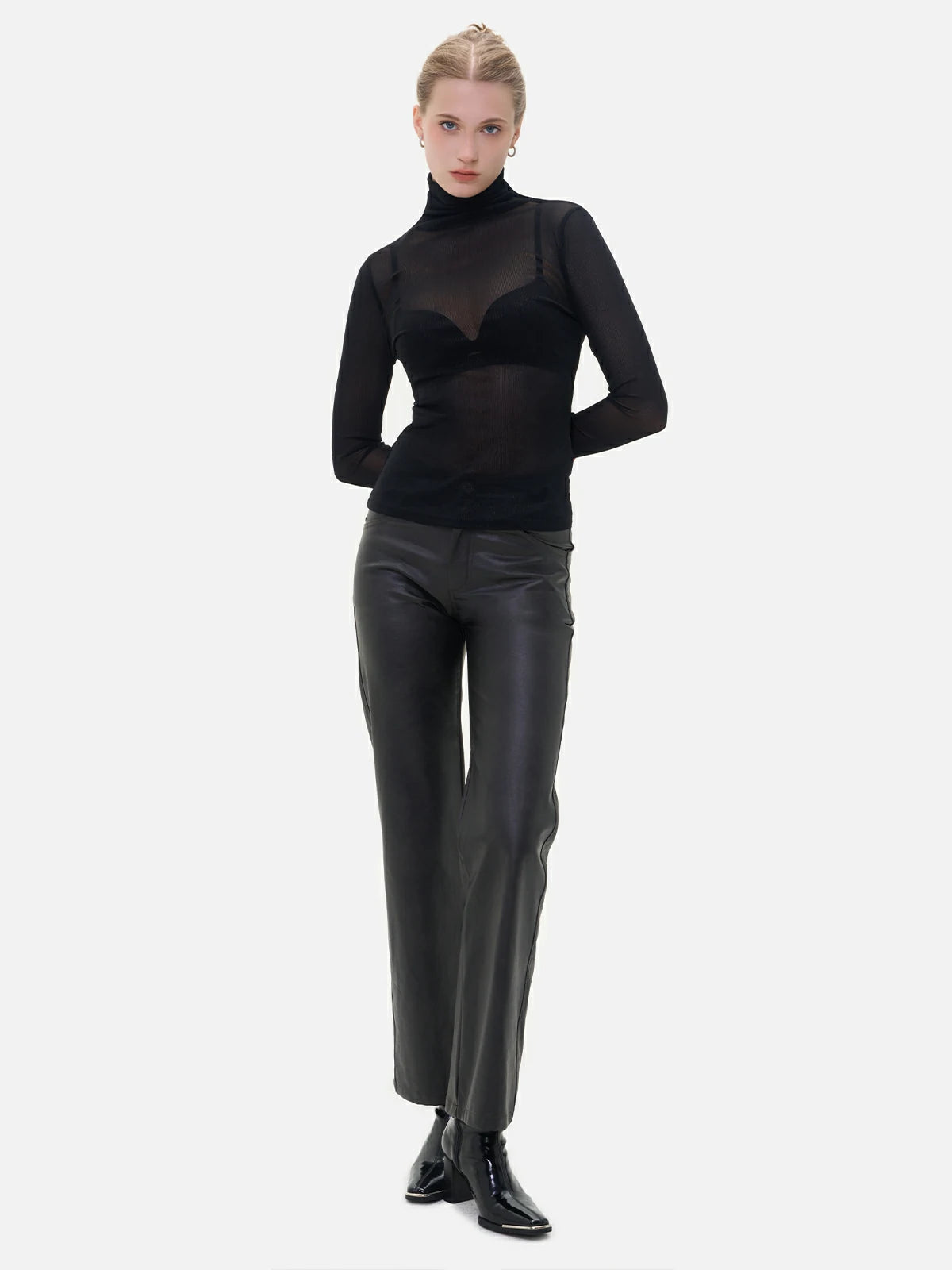 Explore the alluring world of fashion with this elegant high-neck sheer mesh top.