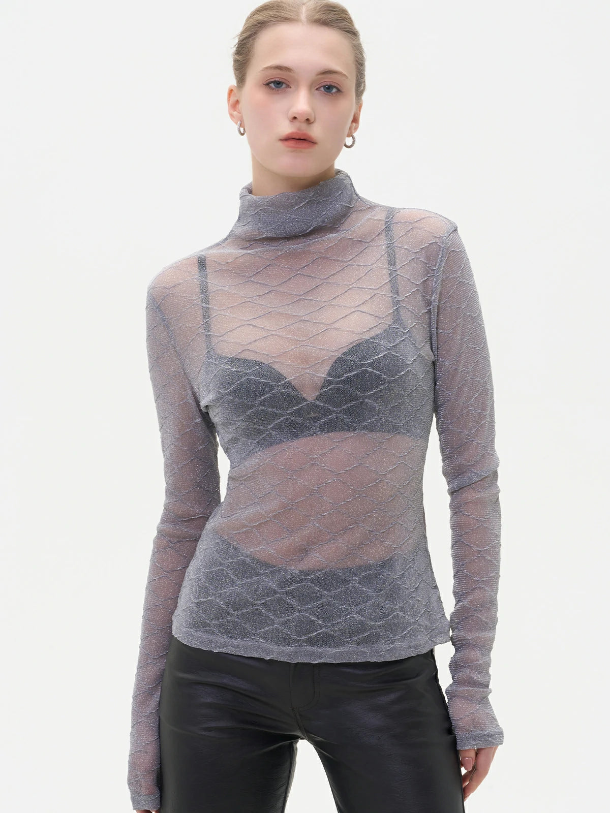 Stylish high-neck sheer base layer with delicate diamond pattern.