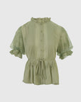 Charming short-sleeved blouse in refreshing green, showcasing ruffle trim accents and a unique waist tie for a feminine and stylish look.