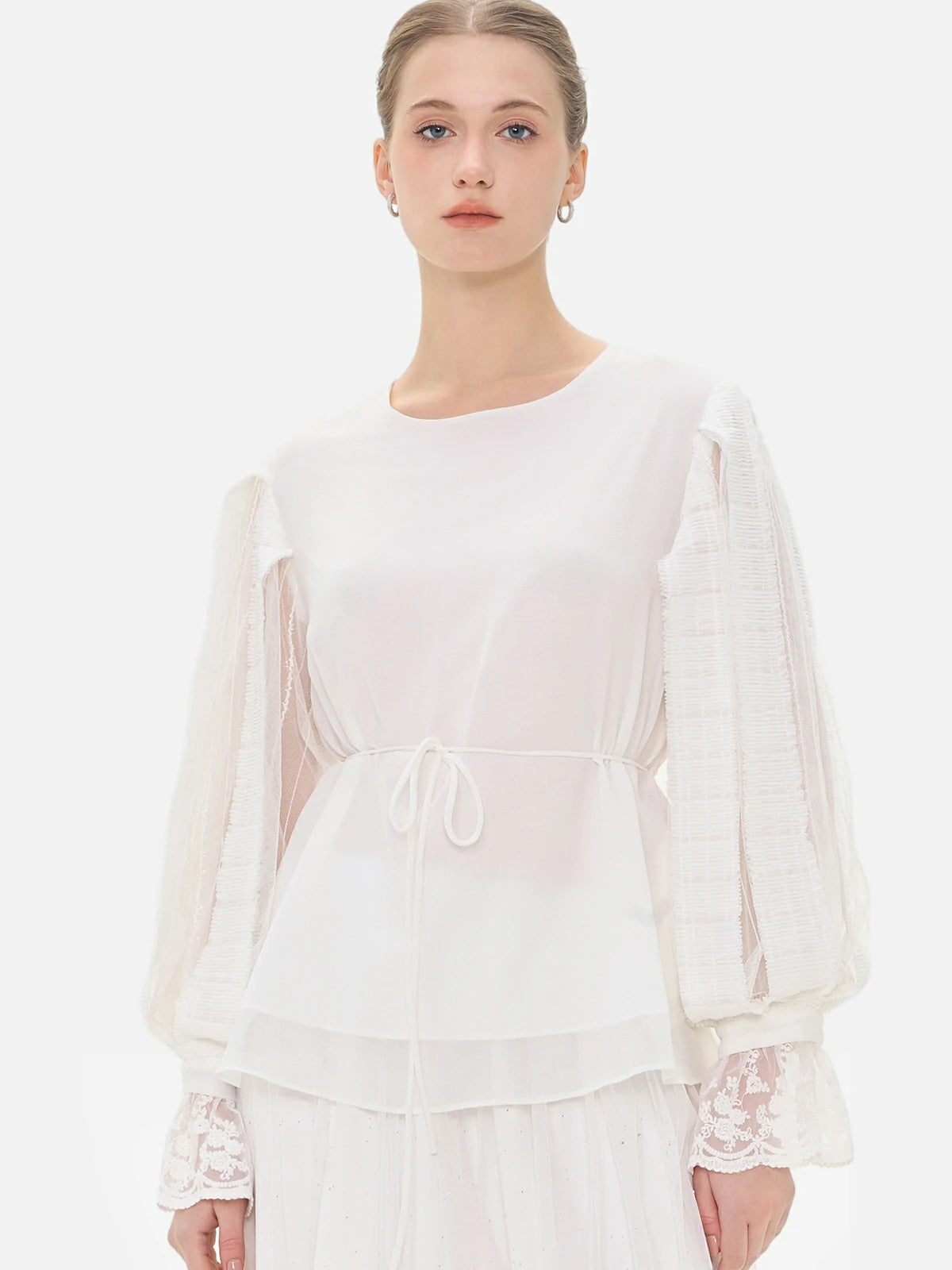 Elegant white blouse with round neckline