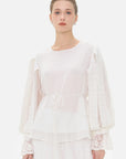 Elegant white blouse with round neckline
