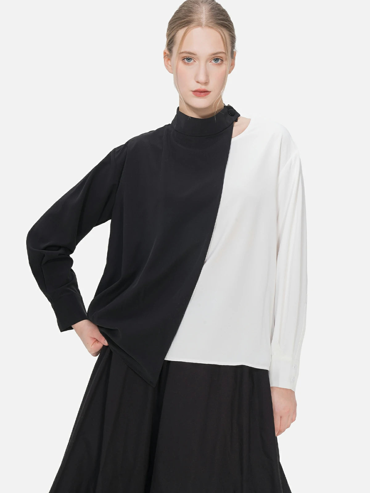 Modern and elegant black and white shirt with a collarbone hollow design, offering a fashion-forward and versatile option for confident and chic attire.