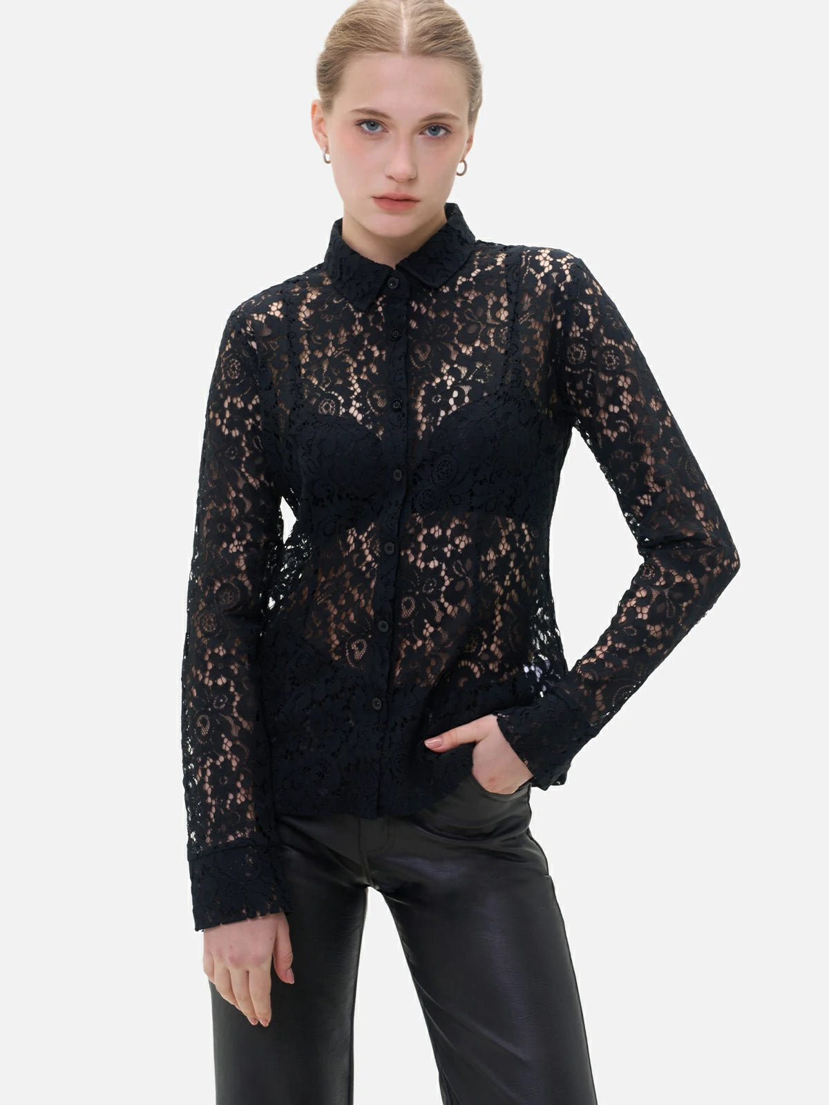 Elegant sheer lace shirt for women, featuring floral patterns and a fitted silhouette