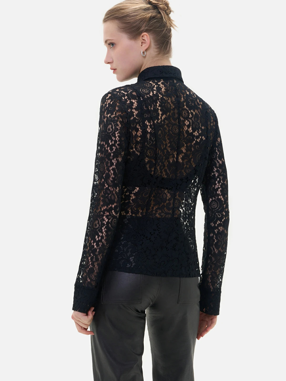 Chic black lace top with button-up front and structured cuffs