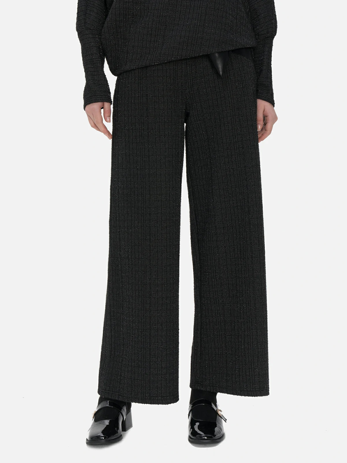 Stylish deep black wide-leg trousers with buckle belt