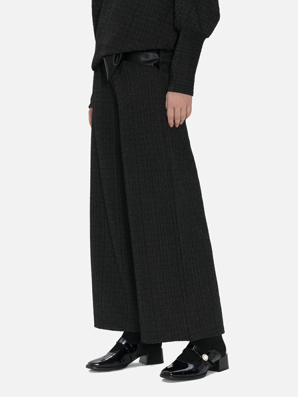 Casual yet stylish deep black trousers with buckle detail