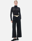 Fashionable wide-leg pants with a distinctive color-blocking flip at the waist, elevating the style quotient