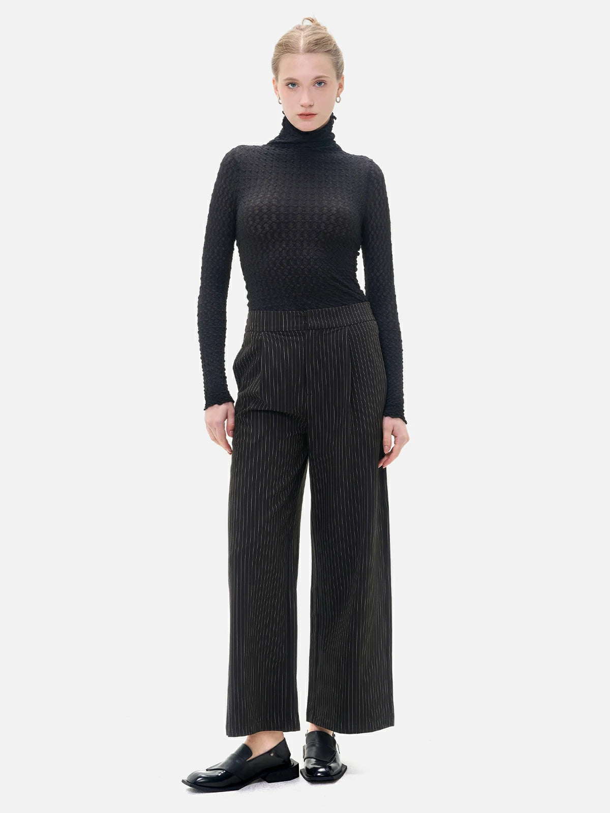 Make a statement in these fashionable comfort wide-leg trousers, showcasing a classic vertical stripe pattern.