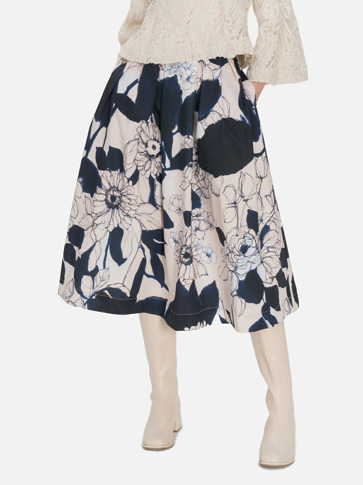 Enchanting high-waisted floral print midi skirt with a pleated A-line silhouette for a graceful look