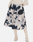 Playful and vibrant floral patterned A-line midi skirt, adding a touch of whimsy to your wardrobe