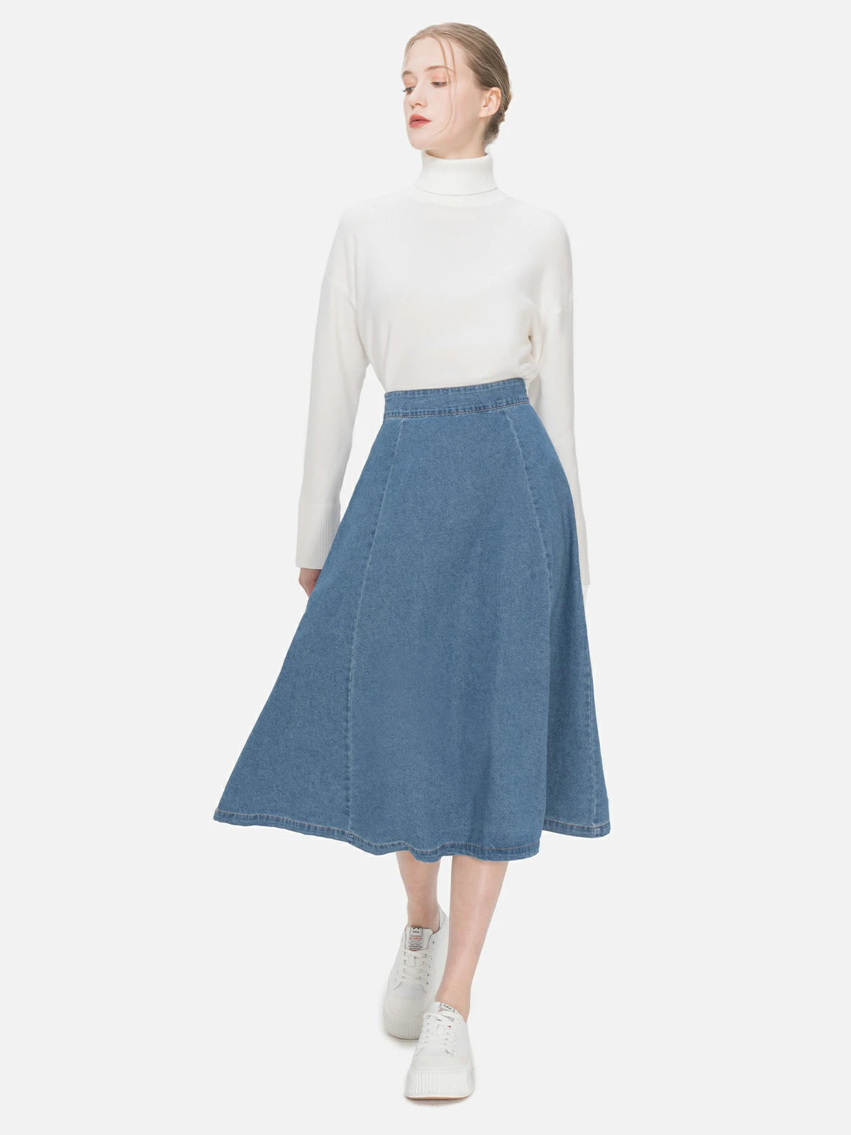 Timeless charm embodied in a blue denim A-line skirt with classic design, high waist, and versatile fashion, ensuring a comfortable and stylish fit for everyday use.