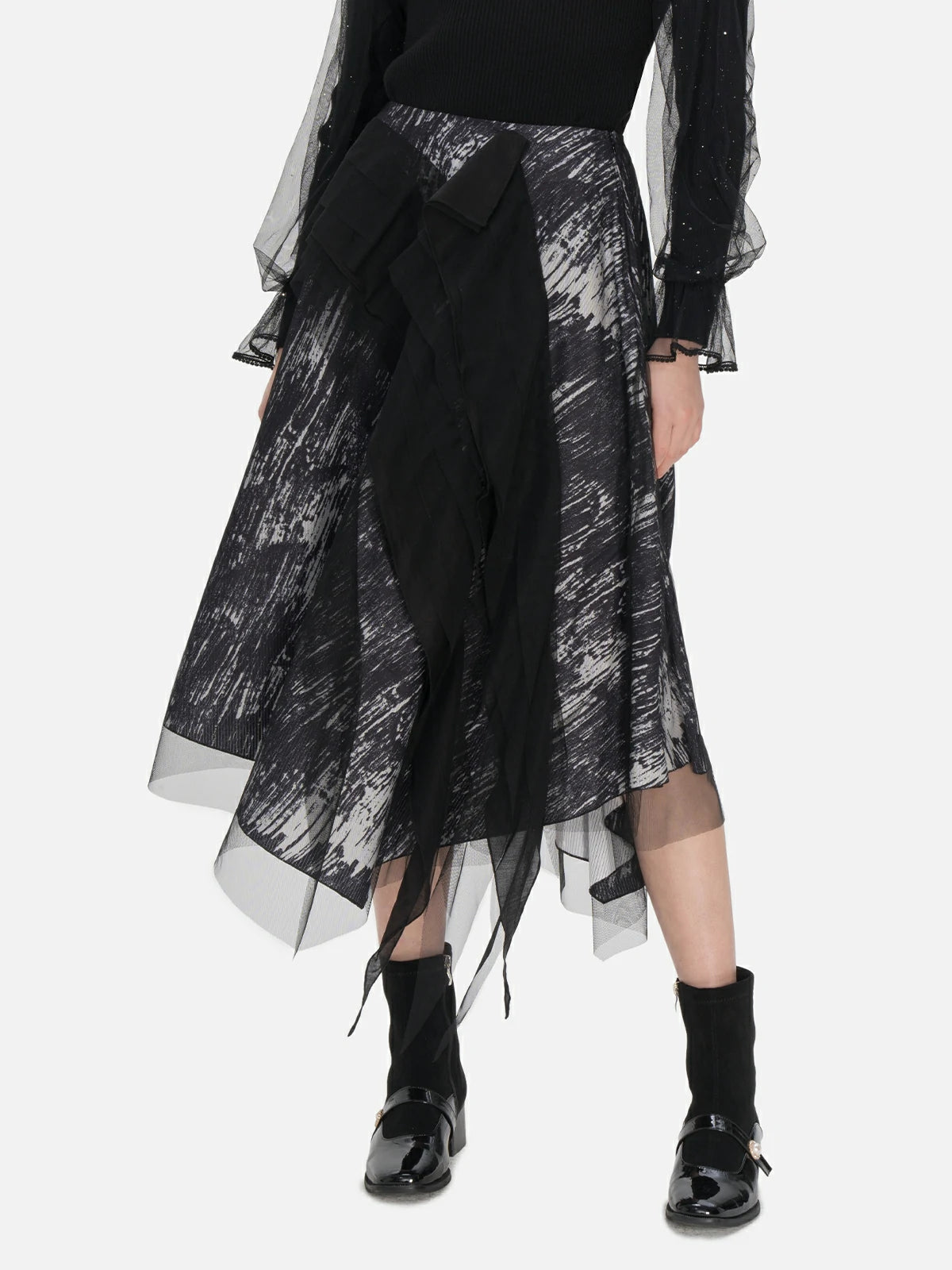 A-line midi skirt adorned with a distinctive black and white ink painting pattern, crafted with a two-layer design including a lightweight tulle outer layer and a soft inner layer.