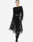 Stylish A-line midi skirt featuring a black and white ink painting pattern, two-layer construction, and an irregular hem, providing both fashion-forward design and comfortable wear for various occasions.