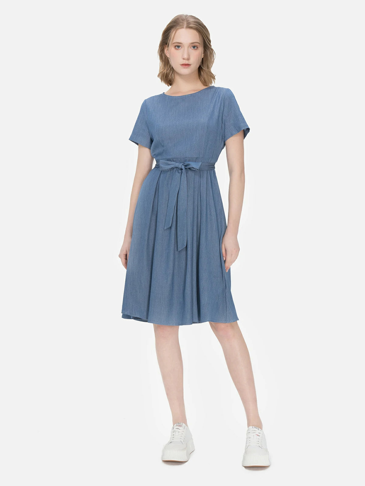 Classic solid color midi dress with tie-waist detail for a timeless look