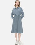 Stylish blue-gray midi dress with an elegant collar design and belted waist, perfect for versatile fashion statements.