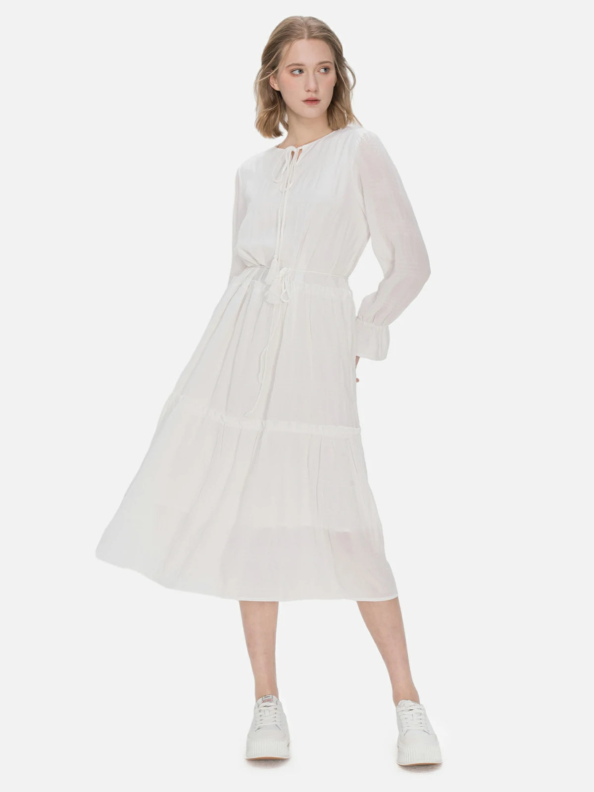 Fresh and elegant white mid-length dress adorned with neckline and waist tie details, creating a tailored fit.