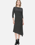 Stylish black knitted dress with an irregular hem, side slit, and drawstring design, offering a comfortable and fashionable silhouette suitable.