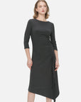 Versatile black knitted dress with an irregular hem and side slit, enhanced by a drawstring design for customizable pleated effects, creating a unique and comfortable outfit suitable.