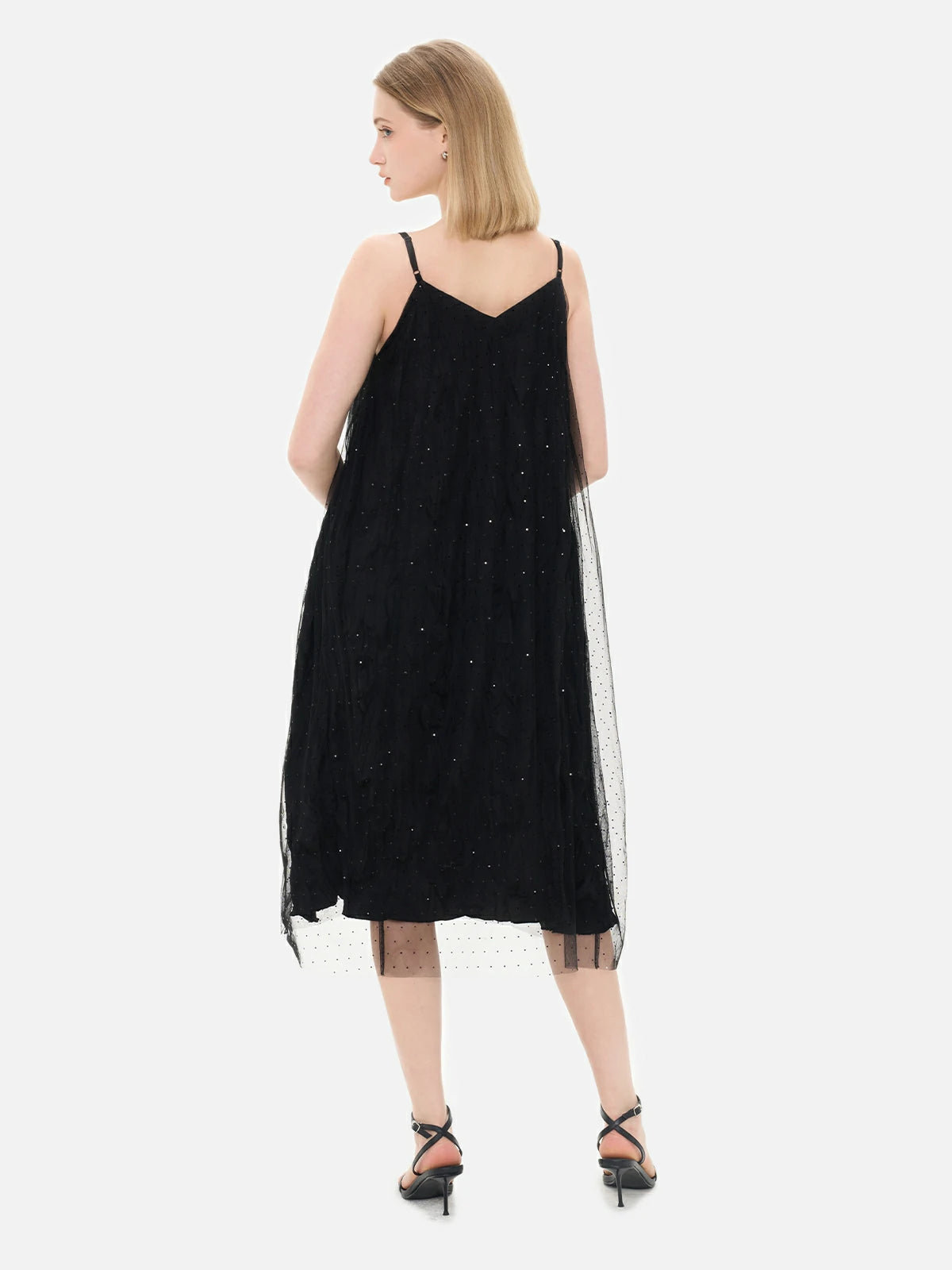 Sparkling black mesh overlay on V-neck spaghetti strap dress with pleated inner layer