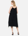 Sparkling black mesh overlay on V-neck spaghetti strap dress with pleated inner layer