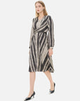 Fashionable women's dress with deep and light striped gradient, featuring a cinched waist.