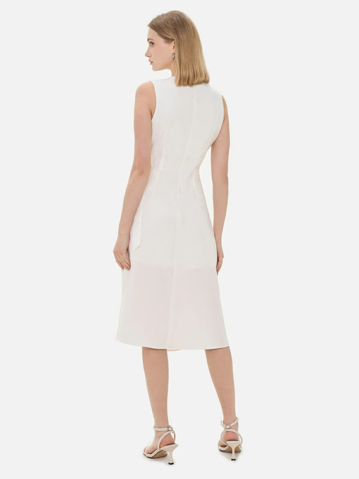 S·DEER white dress with sleek, modern silhouette and statement belt detail