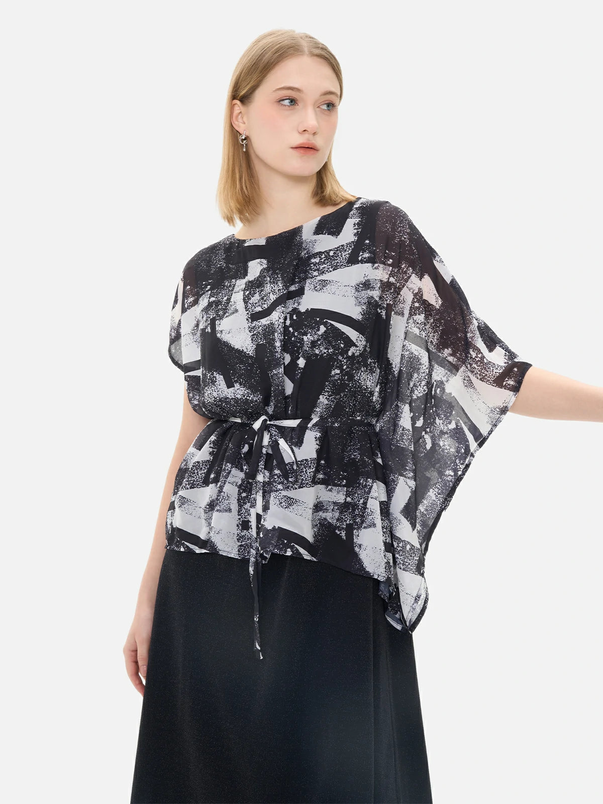 Artistic black and white watercolor dress with asymmetrical sleeves