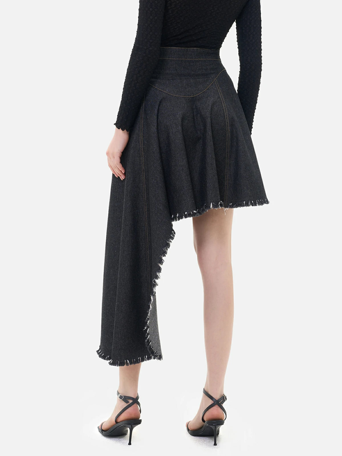 Cutting-edge and asymmetrical denim skirt