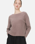Solid color sweater with a contemporary flair for modern style