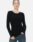 The black slim-fit sweater with a white-accented neckline