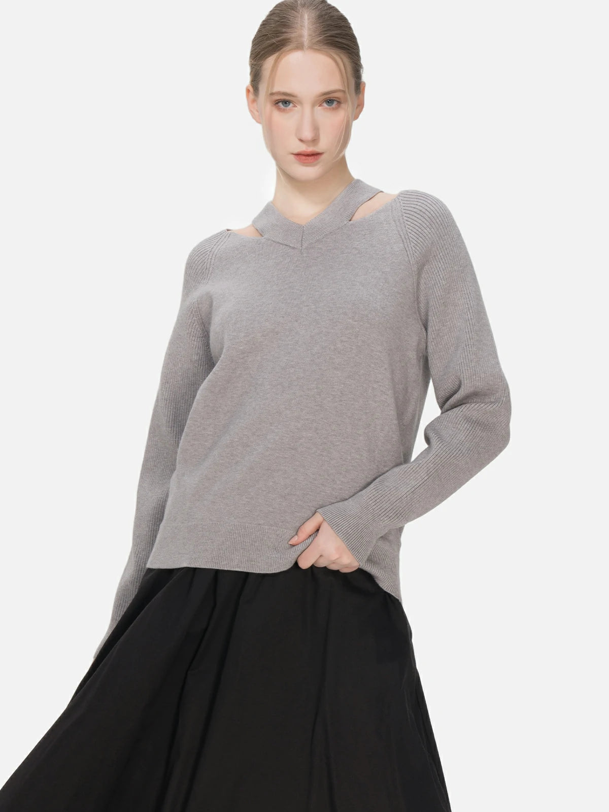 Pullover sweater featuring a forward-thinking and avant-garde aesthetic