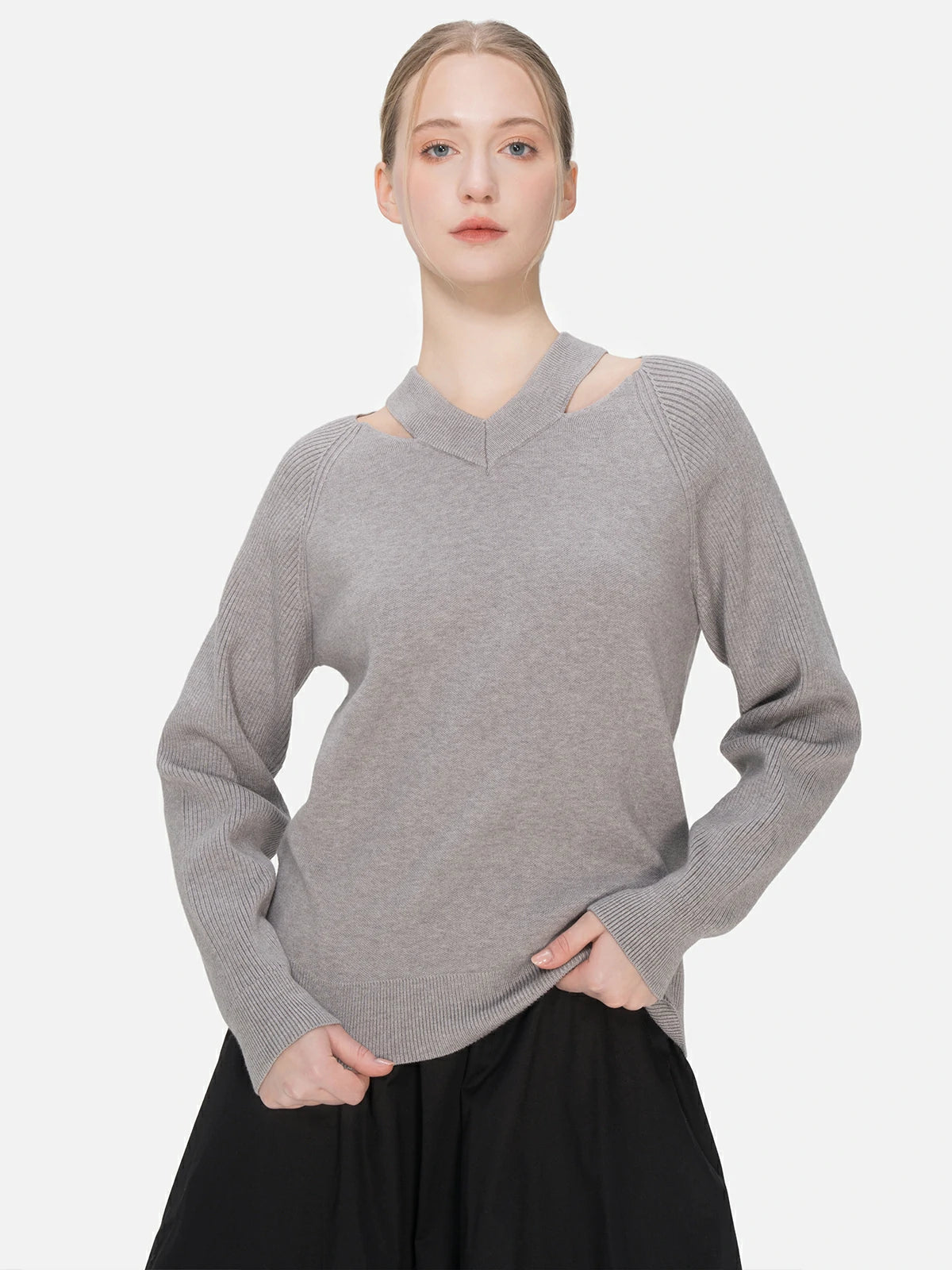 The edgy hollow pattern in a deconstructed design pullover sweater
