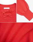 Comfortable fit and stylish details define this red scoop-neck pullover sweater with a lovely bow and threads."