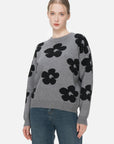 Stylish gray round-neck sweater with a loose-fit design and floral print